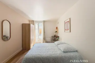 Un ou plusieurs lits dans un hébergement de l'établissement Charming 21m Studio in Paris 20 with shared terrace