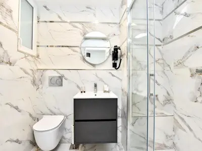 Salle de bains dans l'établissement Authentic apartment - 2BR 6P - near Opéra Garnier