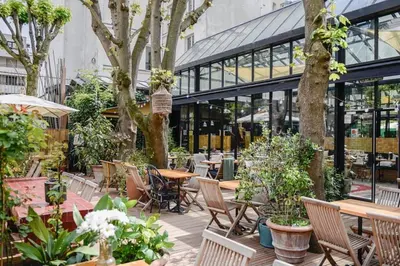 Jardin de l'établissement Spacieux appartement 4 chambres à Alésia