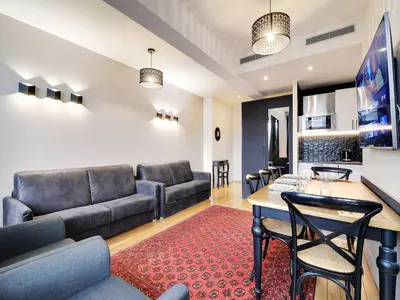 Coin salon dans l'établissement Modern apartment - 2BR 8P - near Opéra Garnier