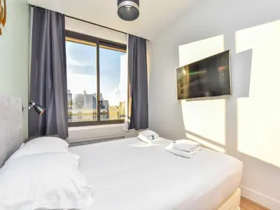 Un ou plusieurs lits dans un hébergement de l'établissement Stunning apartment - 1BR 4P - proche Opéra Garnier