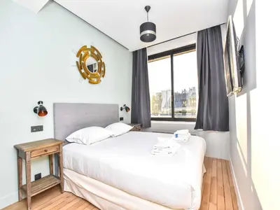 Un ou plusieurs lits dans un hébergement de l'établissement Stunning apartment - 1BR 4P - proche Opéra Garnier