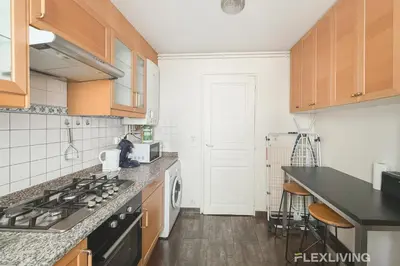 Cuisine ou kitchenette dans l'établissement Charming Room in shared 2-Bedroom Apartment in Paris 5