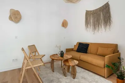 Coin salon dans l'établissement Modern apartment in the heart of Paris
