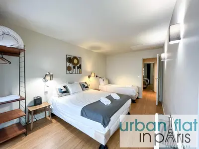 Un ou plusieurs lits dans un hébergement de l'établissement UrbanFlat 131 - Amazing apartment in the center of Paris