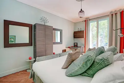 Un ou plusieurs lits dans un hébergement de l'établissement Elegant apartment - 4BR -10P- Madeleine