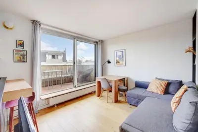 Coin salon dans l'établissement Charming apartment - 1BR- 2P- Nation