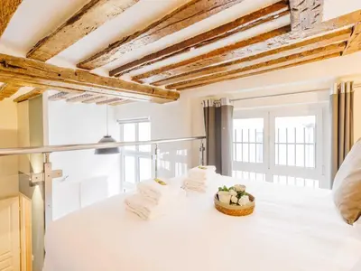 Un ou plusieurs lits dans un hébergement de l'établissement Quiet apartment 1BR 4P - Quartier du Mail