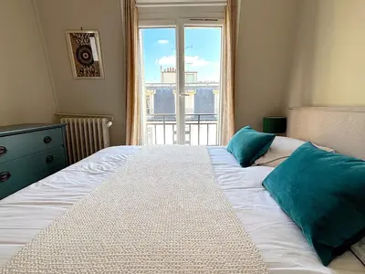 Un ou plusieurs lits dans un hébergement de l'établissement le Penthouse Murat L