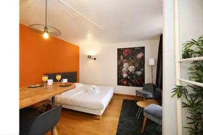 Un ou plusieurs lits dans un hébergement de l'établissement 302 sejournez dans un studio de charme paris 5