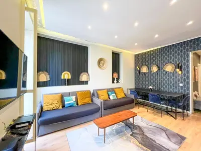 Coin salon dans l'établissement UrbanFlat 61 - 3 Bedrooms Apartment Center of Paris