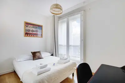 Un ou plusieurs lits dans un hébergement de l'établissement Beautiful apartment - 2BR 4P - Arc de Triomphe