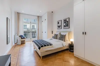Un ou plusieurs lits dans un hébergement de l'établissement Appartement de prestige climatisé