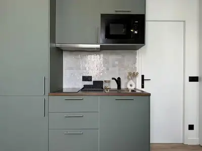 Cuisine ou kitchenette dans l'établissement comfortable in Boulogne ideal location