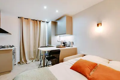 Un ou plusieurs lits dans un hébergement de l'établissement Studio Paris 36 2 people Eiffel Tower