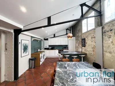 Cuisine ou kitchenette dans l'établissement UrbanFlat 161 - Grand Appartement Central Rue de Paradis