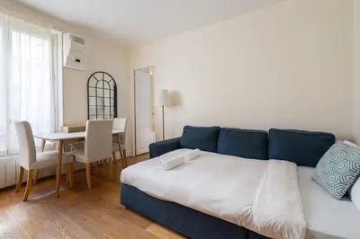 Coin salon dans l'établissement Elegant appartement avec ascenseur proche de la Tour Eiffel