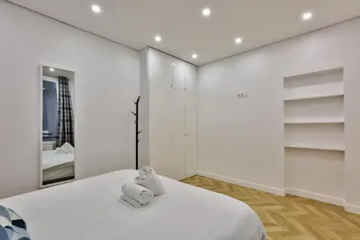 Un ou plusieurs lits dans un hébergement de l'établissement UrbanFlat 92 - Beautiful Apartment in the center of Paris