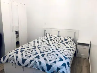 Un ou plusieurs lits dans un hébergement de l'établissement Superbe appartement flambant neuf au centre de Paris