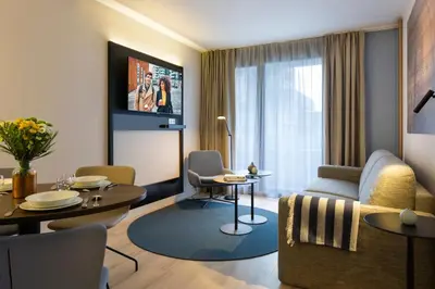 Télévision ou salle de divertissement dans l'établissement Citadines La Défense Paris
