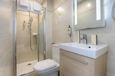 Salle de bains dans l'établissement Hotel De Paris