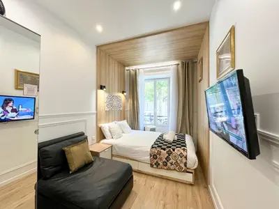 Télévision ou salle de divertissement dans l'établissement 81 - Paris Luxe Sebastopol