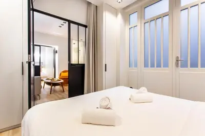 Un ou plusieurs lits dans un hébergement de l'établissement Dreamyflat - caire ll