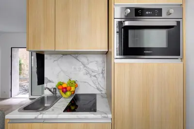 Cuisine ou kitchenette dans l'établissement 158 Suite Jeremy - Superbe Appartement à Paris