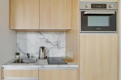 Cuisine ou kitchenette dans l'établissement 158 Suite Jeremy - Superbe Appartement à Paris