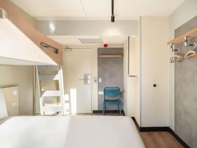 Un ou plusieurs lits dans un hébergement de l'établissement ibis budget Issy Les Moulineaux Paris Ouest