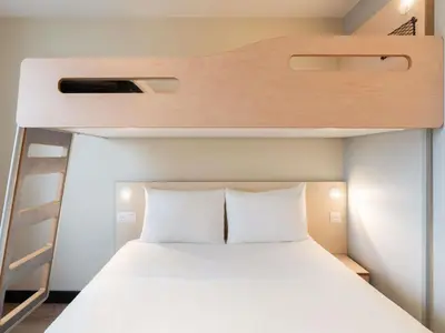 Un ou plusieurs lits dans un hébergement de l'établissement ibis budget Issy Les Moulineaux Paris Ouest