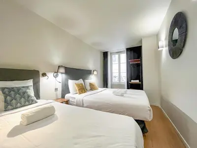 Un ou plusieurs lits dans un hébergement de l'établissement 132 - Urban Beautiful Montorgueil