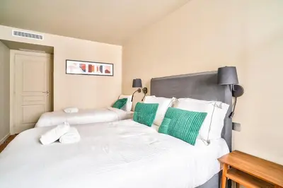 Un ou plusieurs lits dans un hébergement de l'établissement 133 - Urban Amazing Flat Montorgueil