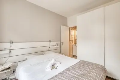 Un ou plusieurs lits dans un hébergement de l'établissement Charming Apartment close to Gare de Lyon