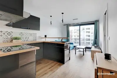 Cuisine ou kitchenette dans l'établissement Cozy apartment - 1BR-4P - next to Paris