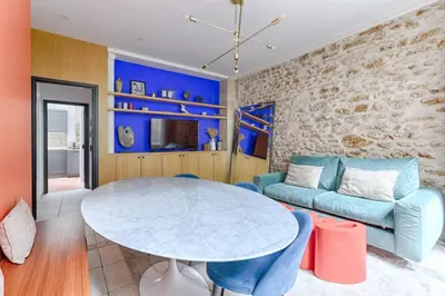 Coin salon dans l'établissement MyKeypers - Splendid Parisian Flat 6P - 2 Bedrooms - Rue Montorgueil