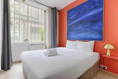 Un ou plusieurs lits dans un hébergement de l'établissement MyKeypers - Splendid Parisian Flat 6P - 2 Bedrooms - Rue Montorgueil