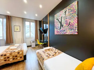 Un ou plusieurs lits dans un hébergement de l'établissement UrbanFlat 158 - Louis Flat in Montorgueil