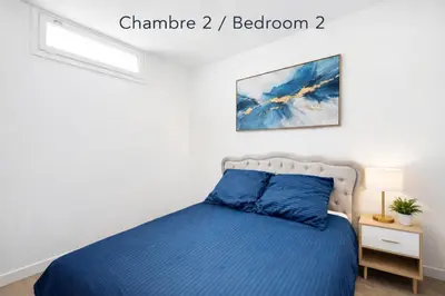 Un ou plusieurs lits dans un hébergement de l'établissement Magnifique 4 personnes Paris 18ème